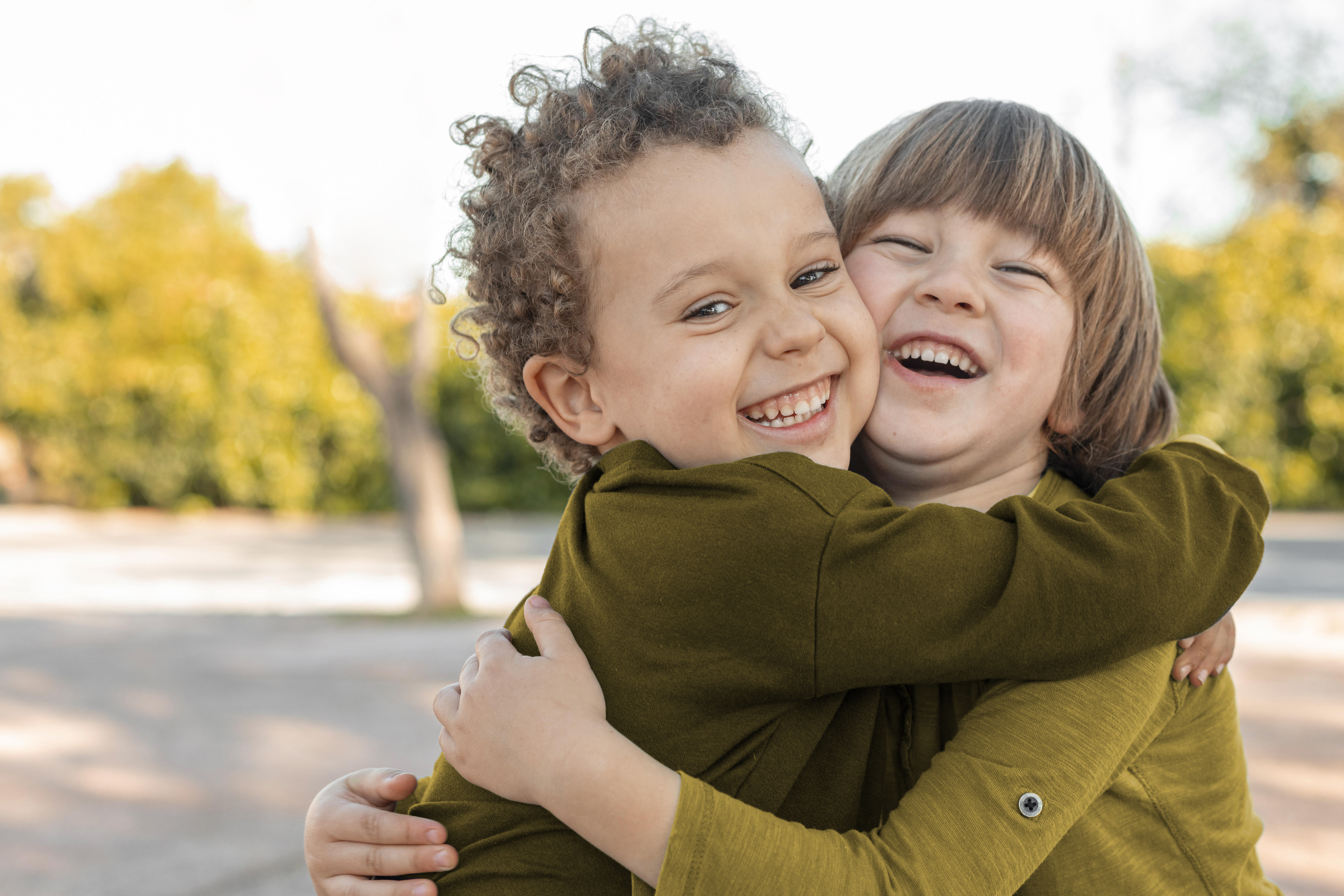 hug moments sibling photo ideas